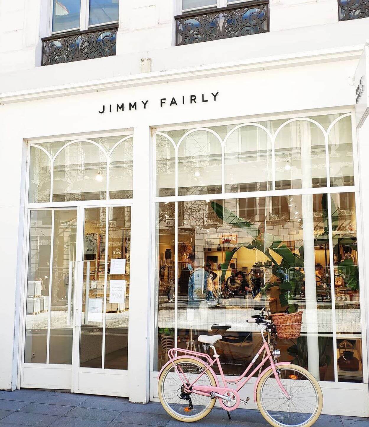 front of a Jimmy Fairly store